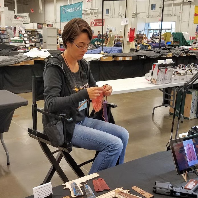 The Peahen kniting in public for World Wide Knit in Public Day