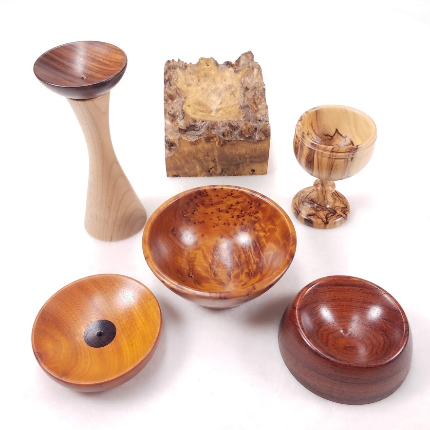 A selection of wooden supported spindle bowls