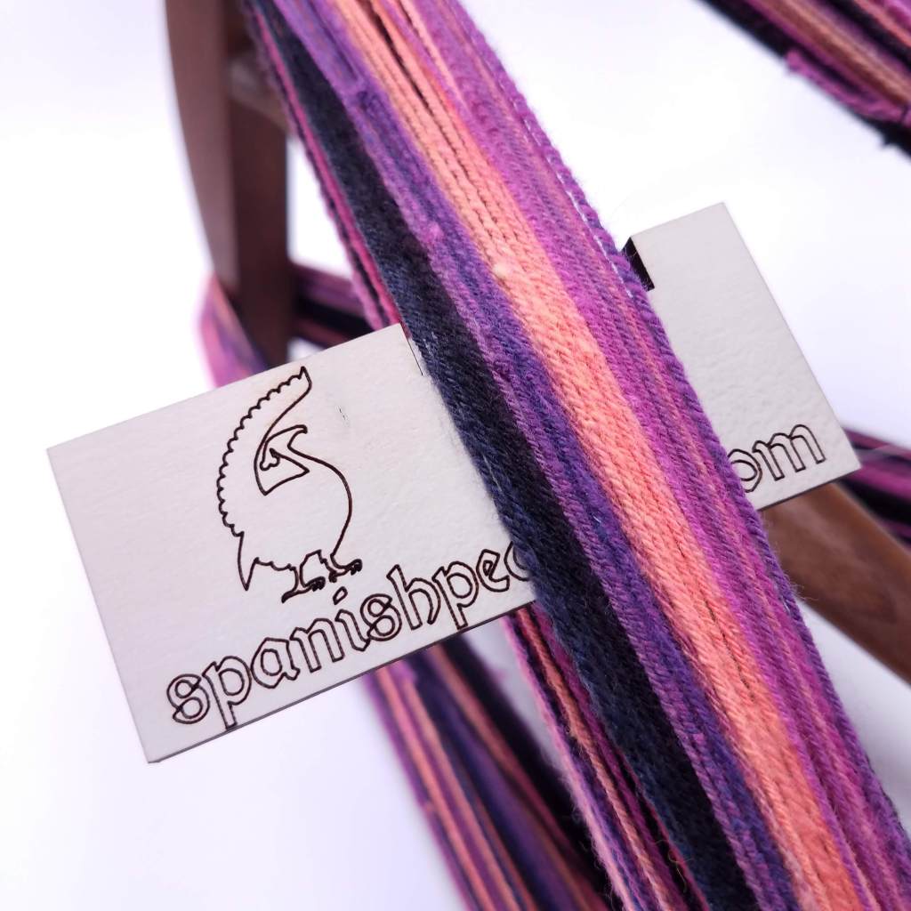 Plyed yarn on my niddy noddy