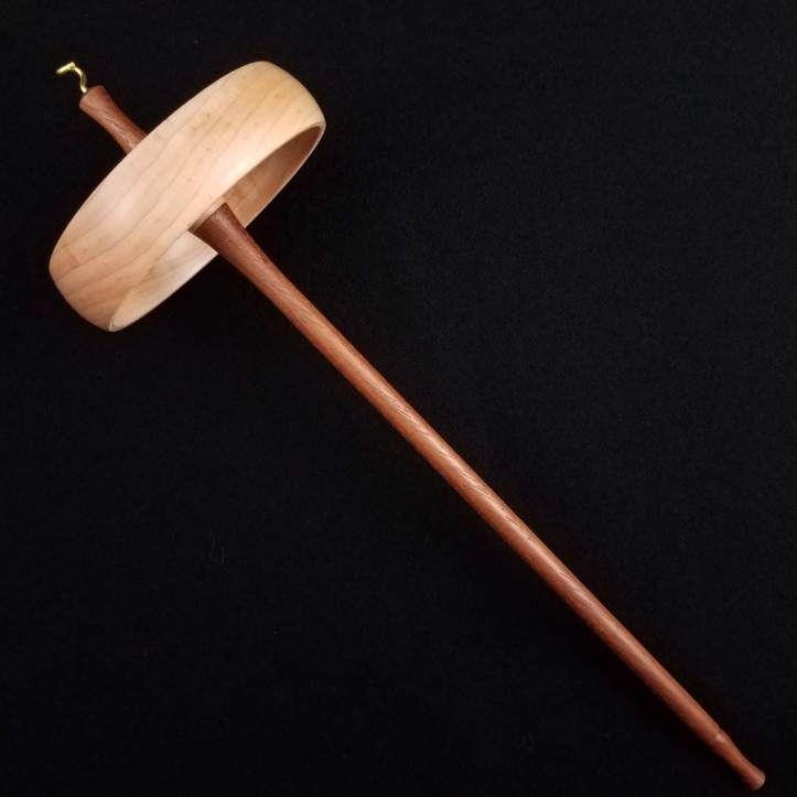 A Spanish Peacock large top whorl, featuring a cherry whorl on a walnut shaft