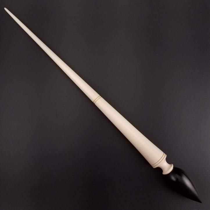 A Spanish Peacock Russian lace spindle with a different tip from shaft