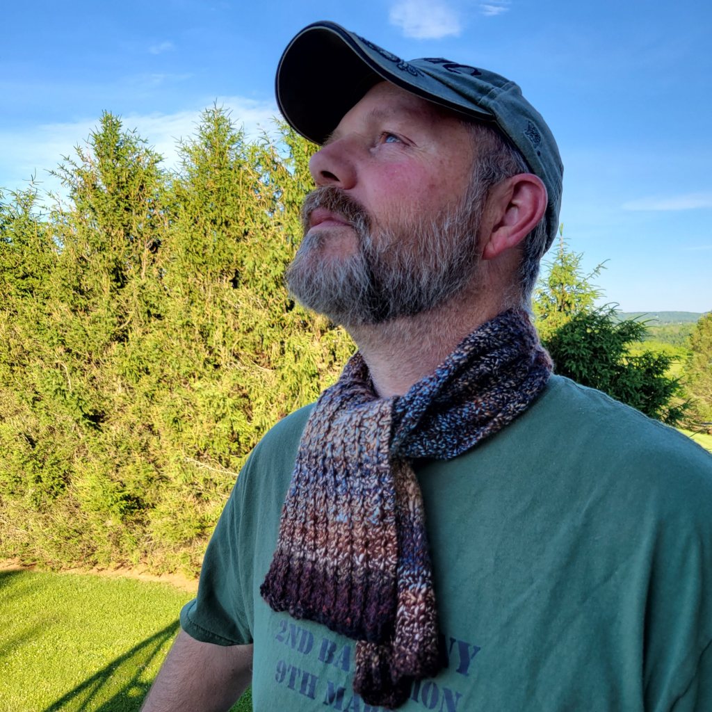 Mike shows off his new scarf