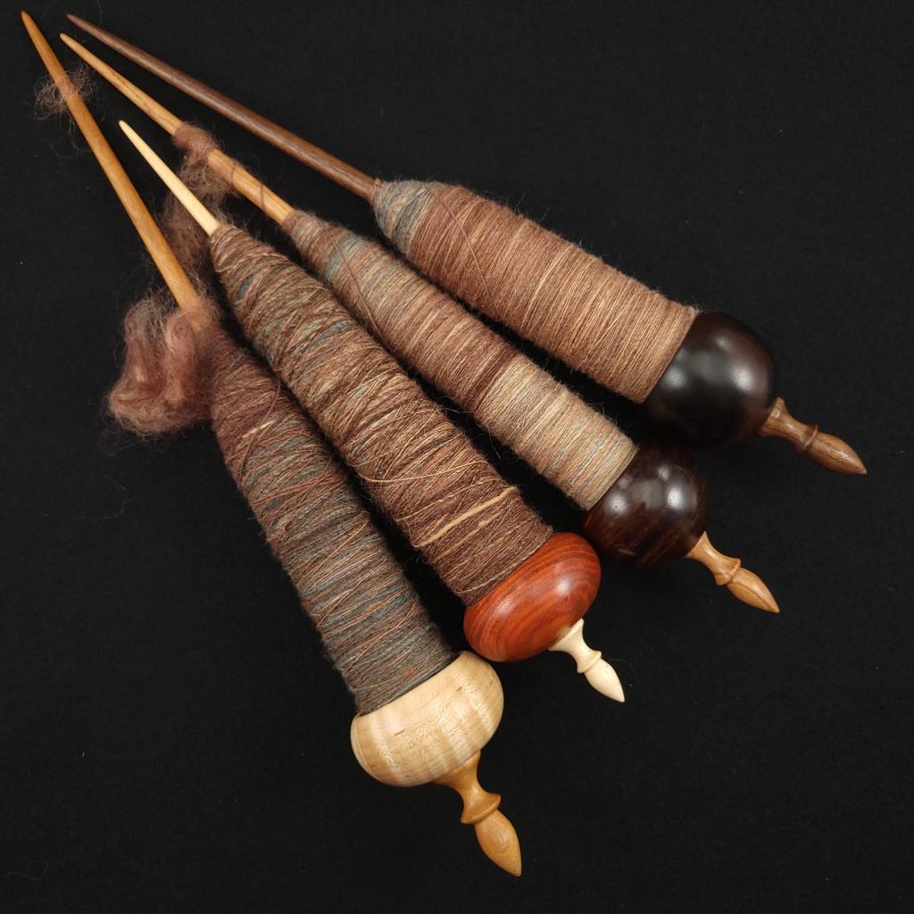 The four spindles of my Tour de Fleece 2021 WIP 1